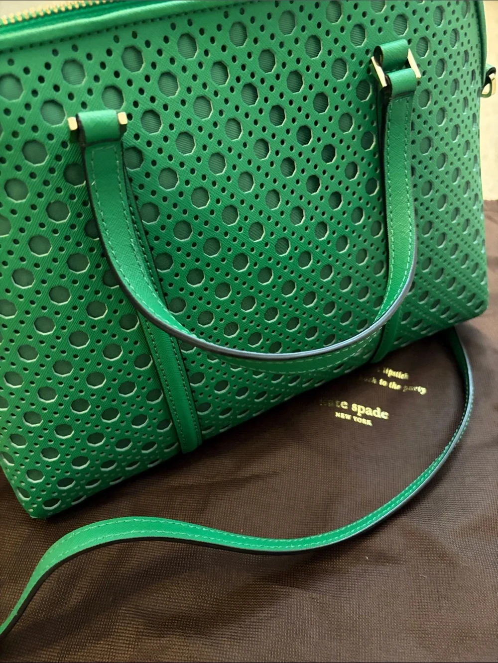 kate spade green perforated satchel with gold plaque